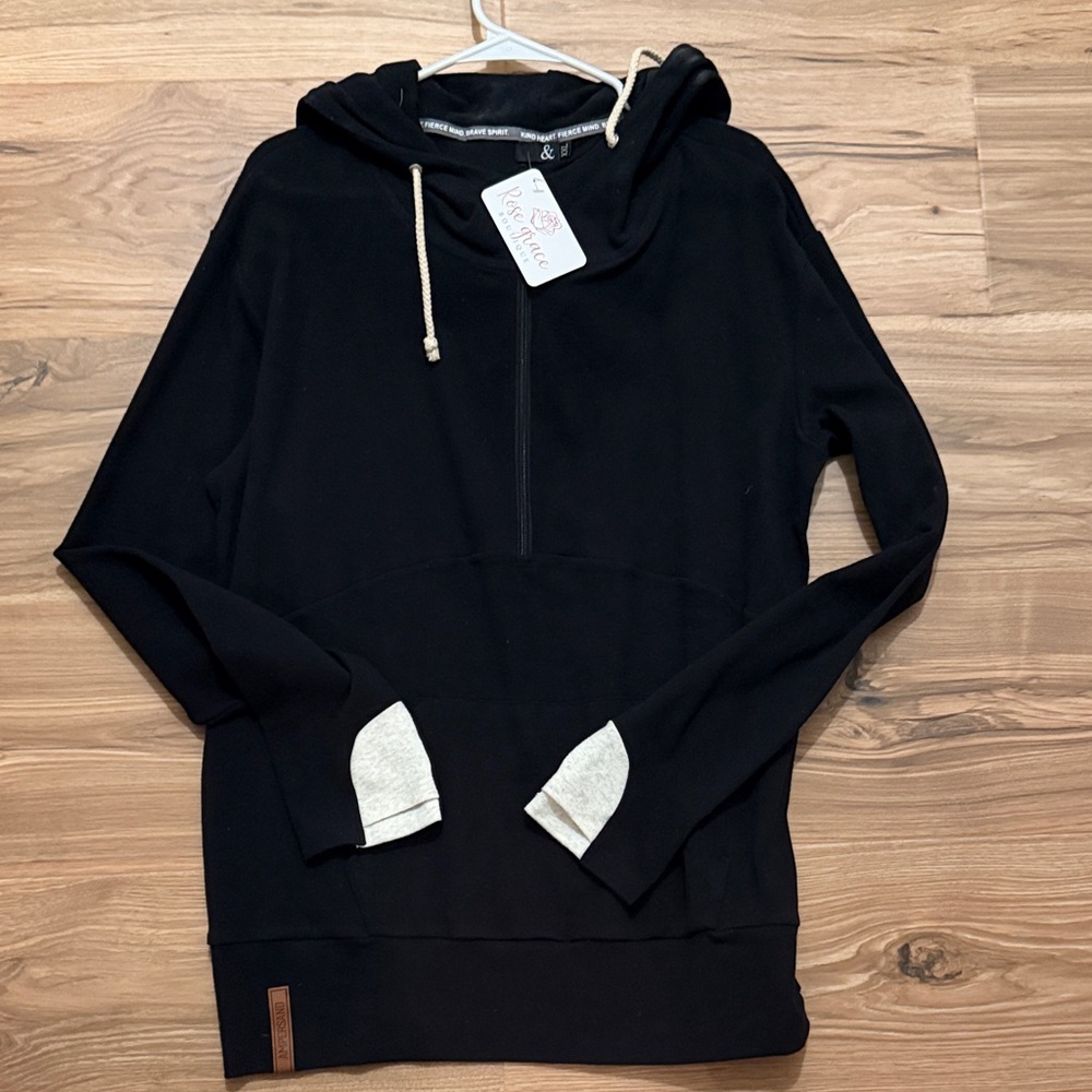 Elegant Black half Zip-Up Sweater with Cream Accents.